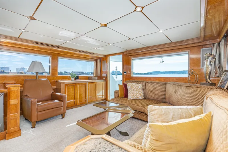 Slide: The Image of Luxurious interior of 1996 Hatteras 70 Sport Deck Motor Yacht with elegant furnishings. - 35