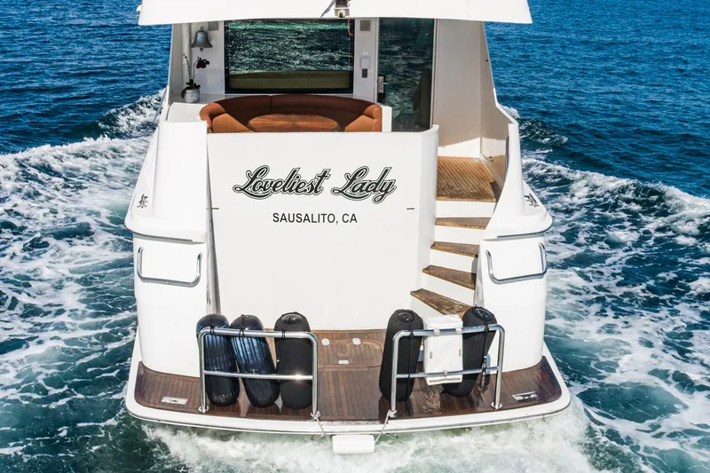 Slide: The Image of 1996 Hatteras 70 Sport Deck Motor Yacht, "Loveliest Lady," cruising in Sausalito, CA waters. - 28