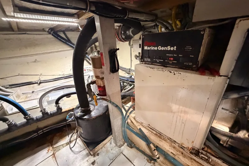 Slide: The Image of Engine room of 1996 Hatteras 70 Sport Deck Motor Yacht with Marine GenSet. - 99