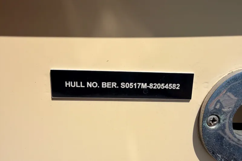 Slide: The Image of Hull number plate on 1982 Bertram 54 Convertible boat. - 15