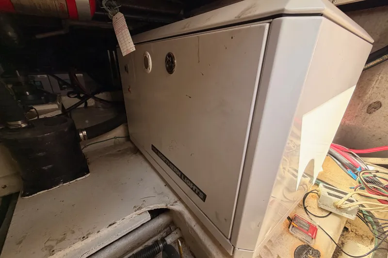 Slide: The Image of Engine room of 1982 Bertram 54 Convertible with electrical panel and wiring. - 45