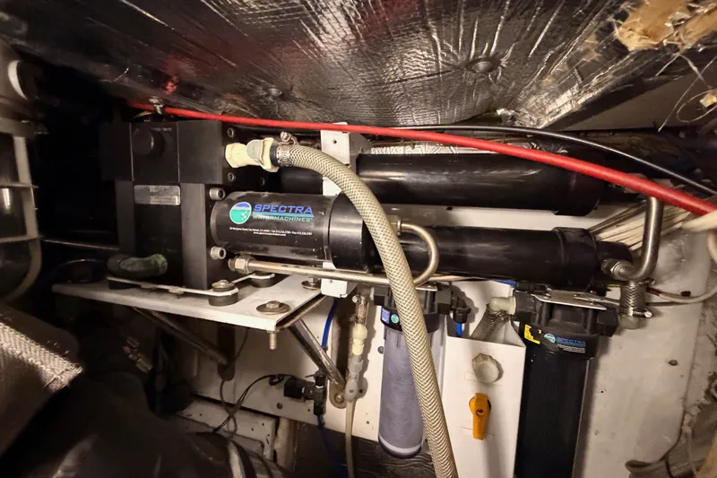 Slide: The Image of Engine room of a 1982 Bertram 54 Convertible with Spectra watermaker system. - 97