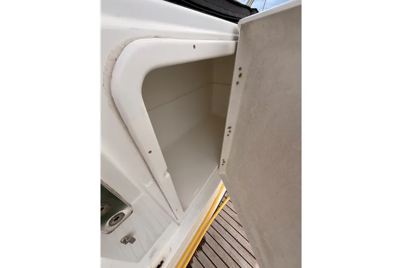 Slide: The Image of Open storage compartment on a 2008 Beneteau 49 yacht, showcasing interior space. - 26