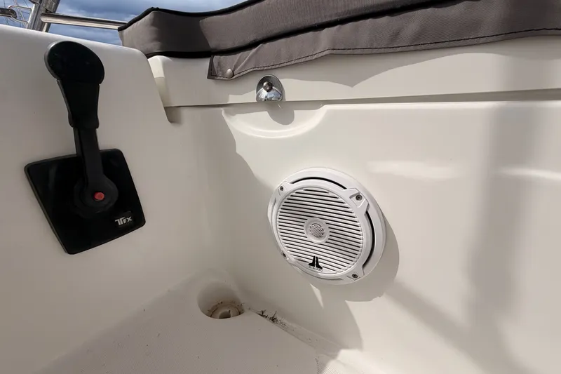 Slide: The Image of Boat interior of a 2008 Beneteau 49 with control lever and speaker. - 34