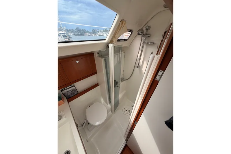 Slide: The Image of Interior of 2008 Beneteau 49 yacht bathroom with shower and toilet. - 51