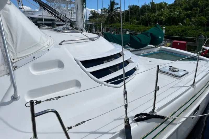 Slide: The Image of 2004 Manta 42 MkII catamaran deck with sleek design and modern features. - 3