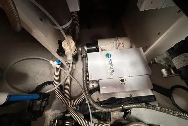 Slide: The Image of Engine compartment of a 2004 Manta 42 MkII with Spectra watermaker system. - 43