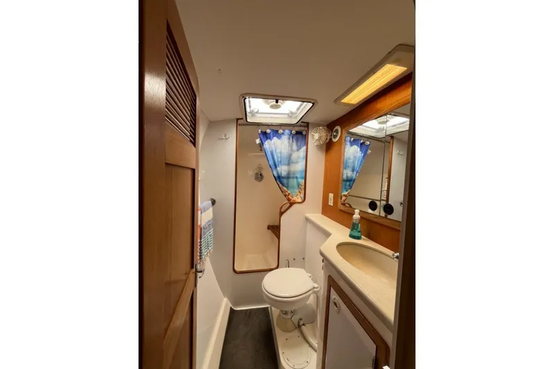 Slide: The Image of Bathroom interior of 2004 Manta 42 MkII yacht with shower and sink. - 35