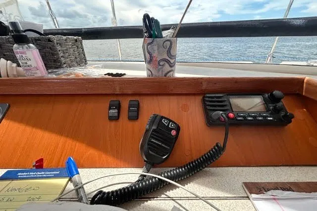 Slide: The Image of Cockpit of 2004 Manta 42 MkII sailboat with radio and navigation tools. - 30