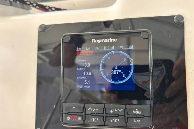 Slide: The Image of Raymarine navigation display on 2004 Manta 42 MkII showing compass and speed data. - 21