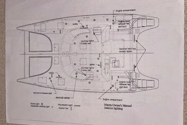 Slide: The Image of Diagram of 2004 Manta 42 MkII catamaran interior lighting layout from owner's manual. - 53