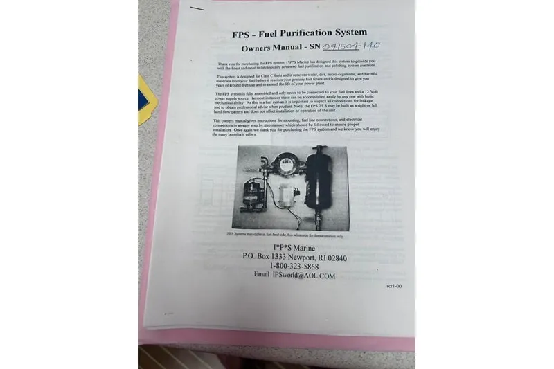 Slide: The Image of Owner's manual for FPS fuel purification system with contact details and product image. - 56