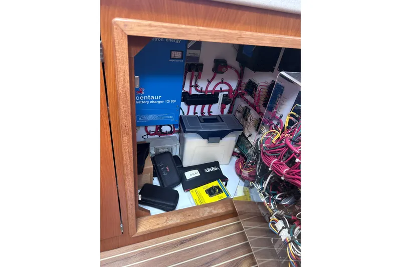 Slide: The Image of Electrical system inside a 2004 Manta 42 MkII, featuring a Centaur battery charger. - 19