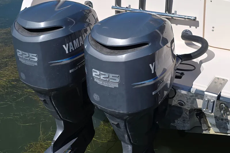 Slide: The Image of Twin Yamaha 225 four-stroke outboard motors on a 2003 Grady-White Sailfish 282 boat. - 4