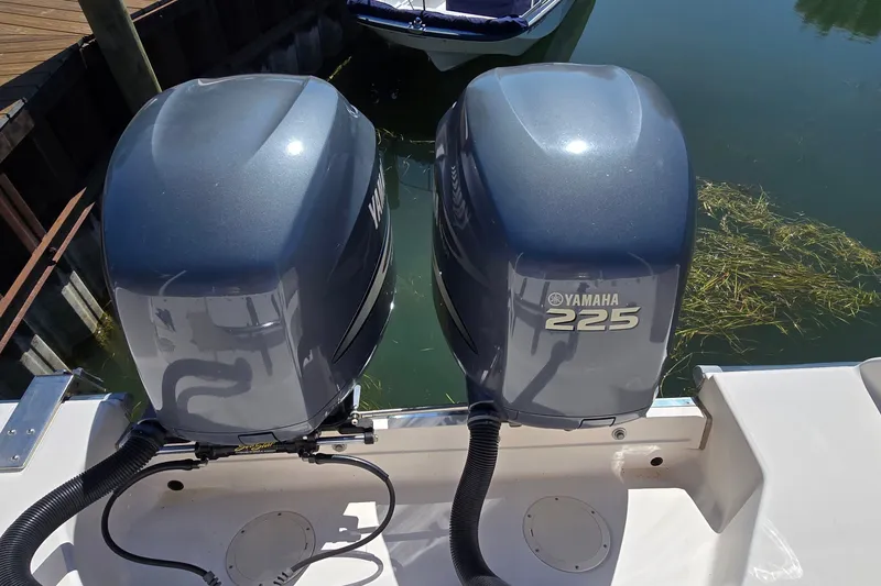 Slide: The Image of Twin Yamaha 225 outboard motors on a 2003 Grady-White Sailfish 282 boat. - 29