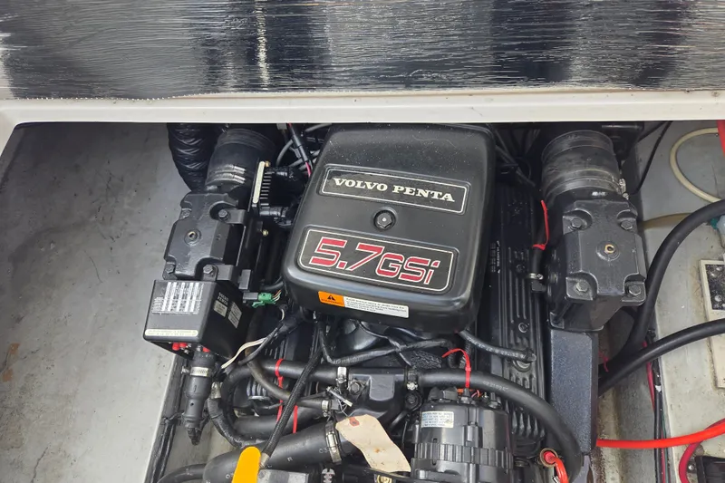 Slide: The Image of Engine compartment of a 1999 Four Winns 258 Vista with Volvo Penta 5.7 GSi engine. - 20
