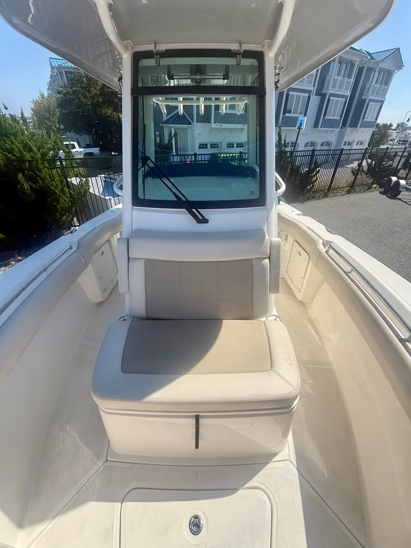 Slide: The Image of Boston Whaler 250 Outrage 2024: Spacious bow area with seating and windshield. - 26
