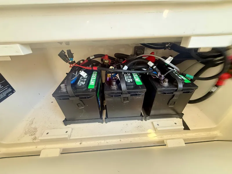 Slide: The Image of Three batteries are housed in a compartment of the 2024 Boston Whaler 250 Outrage. - 25