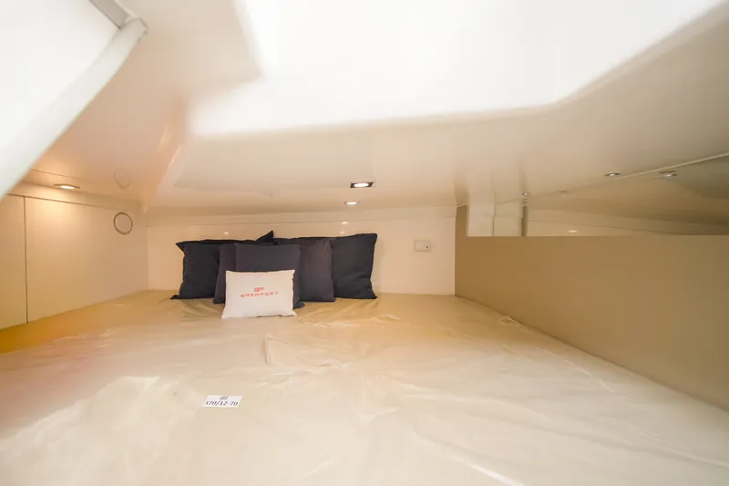 Slide: The Image of Interior cabin of 2026 Granfort 370 GTX yacht with cozy bedding and pillows. - 32