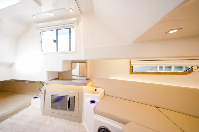 Slide: The Image of Luxurious interior of 2026 Granfort 370 GTX yacht with modern amenities and sleek design. - 28