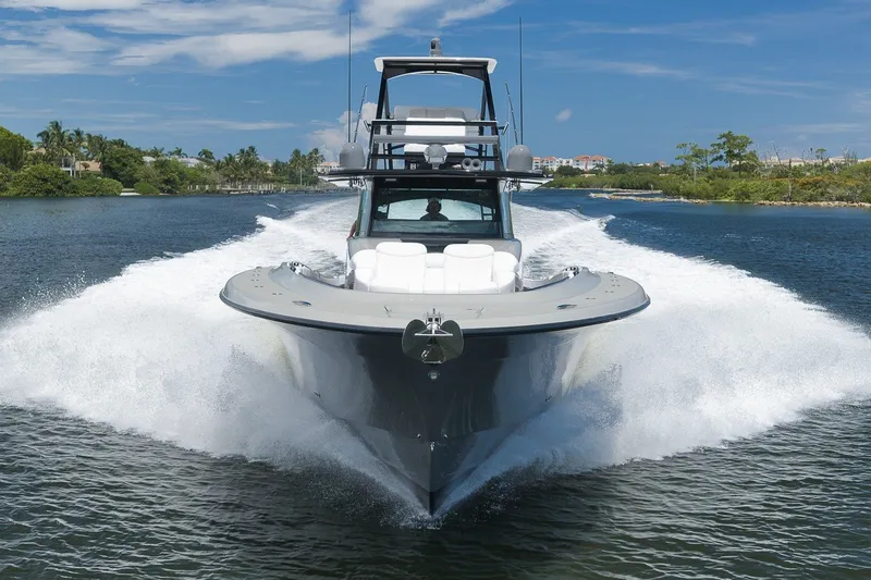 Slide: The Image of 2023 HCB 65 Estrella luxury yacht cruising on a scenic waterway. - 8
