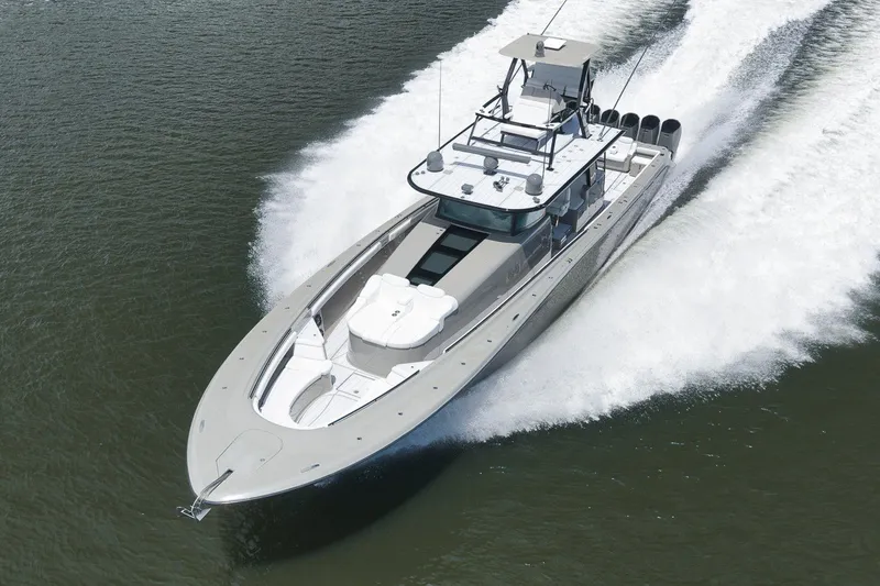 Slide: The Image of 2023 HCB 65 Estrella luxury yacht cruising on open water. - 7