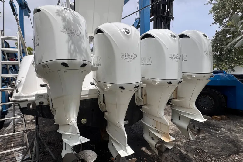 Slide: The Image of Four Yamaha 350 V8 outboard engines on a 2016 Everglades 435 Center Console boat. - 4