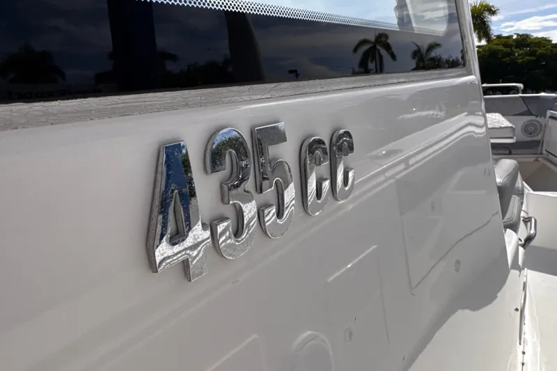 Slide: The Image of Close-up of 2016 Everglades 435 Center Console boat emblem in sunlight. - 11