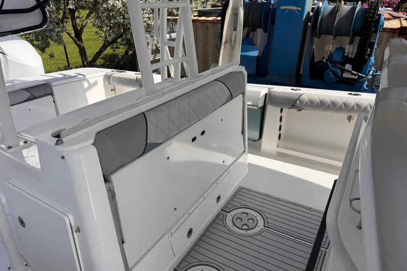 Slide: The Image of 2016 Everglades 435 Center Console boat interior with seating and equipment. - 20