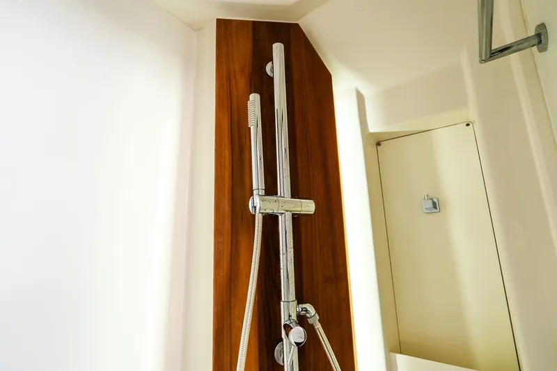Slide: The Image of Modern shower fixture in a 2021 Jupiter 43 yacht bathroom. - 69
