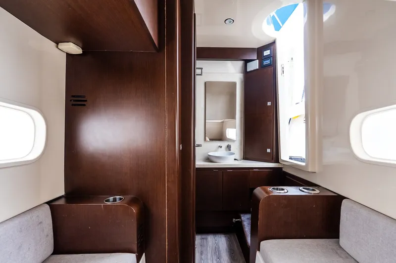 Slide: The Image of Interior of 2021 Jupiter 43 yacht featuring modern bathroom and seating area. - 61