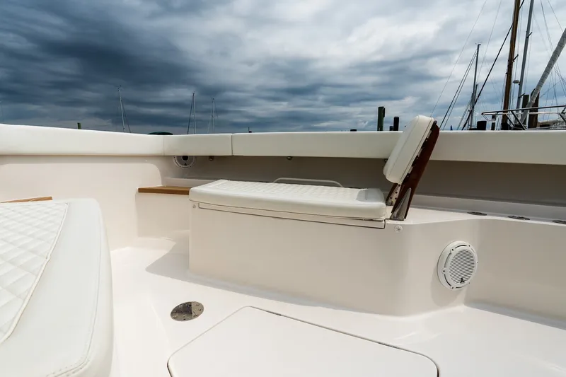 Slide: The Image of Luxurious seating on 2021 Jupiter 43 boat under cloudy sky. - 55