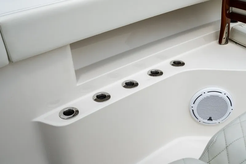Slide: The Image of Interior of 2021 Jupiter 43 boat with rod holders and speaker. - 51