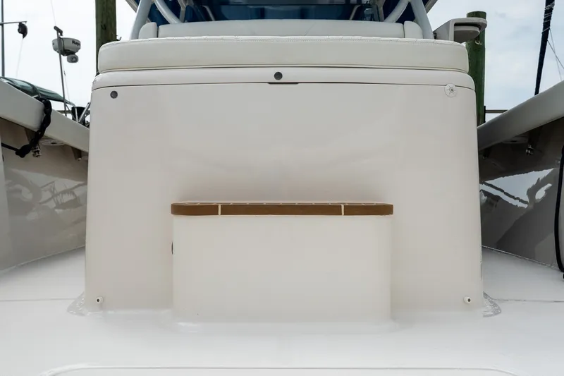 Slide: The Image of 2021 Jupiter 43 boat interior with cushioned seating and sleek design. - 29