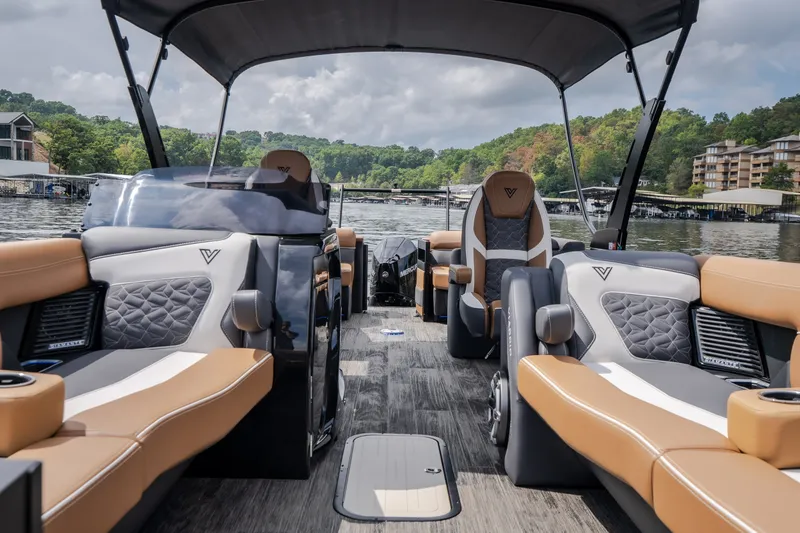 Slide: The Image of Luxurious 2026 Viaggio Diamante U 26 boat interior with plush seating on a scenic lake. - 31