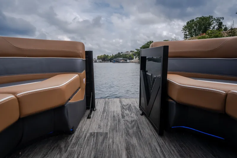 Slide: The Image of Luxury seating on Viaggio Diamante U 26 boat, 2026 model, overlooking serene lake. - 26