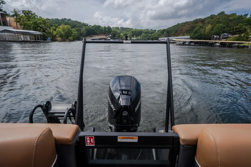 Slide: The Image of Viaggio Diamante U 26 boat on a scenic lake with lush green surroundings, 2026 model. - 42