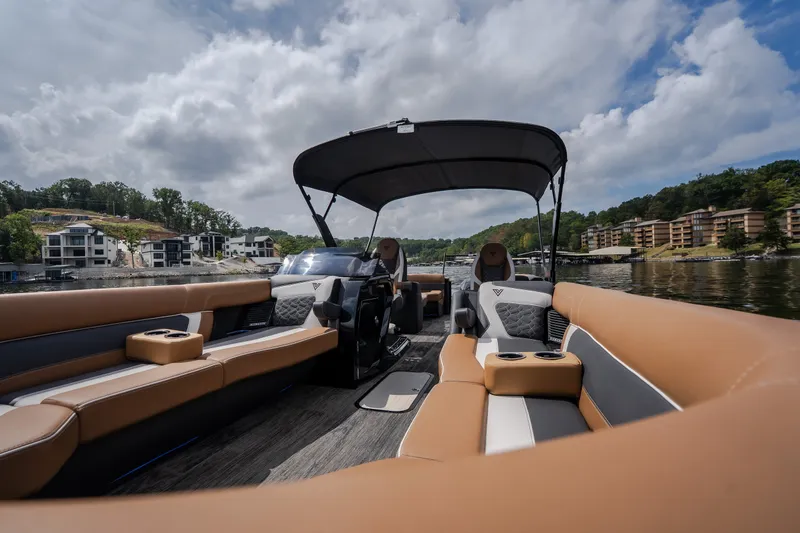 Slide: The Image of Luxurious 2026 Viaggio Diamante U 26 boat interior with plush seating on a scenic lake. - 34