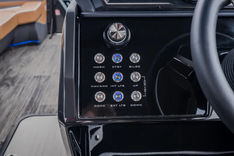 Slide: The Image of Control panel of 2026 Viaggio Diamante U 26 boat with labeled buttons and steering wheel. - 14