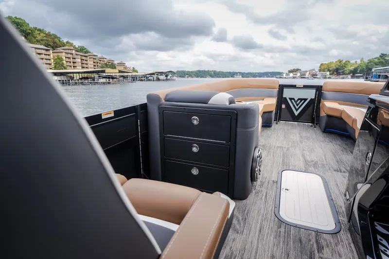 Slide: The Image of Luxurious 2026 Viaggio Diamante U 26 pontoon boat interior with plush seating and scenic lake view. - 19