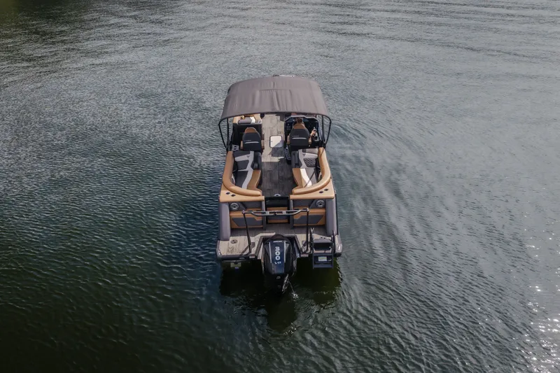 Slide: The Image of 2026 Viaggio Diamante U 26 pontoon boat on calm water, rear view. - 57