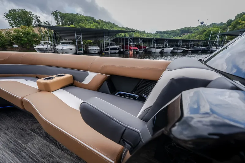 Slide: The Image of Luxurious seating on the 2026 Viaggio Diamante U 26 boat, docked near a marina. - 25