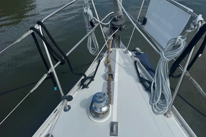 Slide: The Image of Deck view of 1998 J Boats J/160 sailboat with ropes and winch. - 30