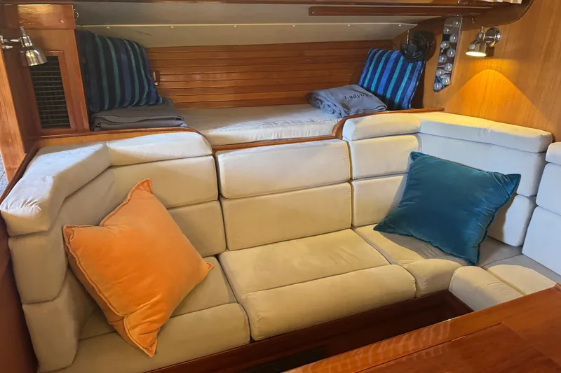 Slide: The Image of Luxurious interior of 2020 J Boats J/160 yacht with cozy seating and vibrant cushions. - 5