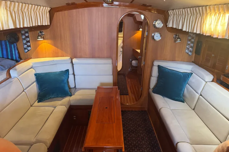 Slide: The Image of Luxurious interior of 2020 J Boats J/160 yacht with plush seating and elegant wood finishes. - 4