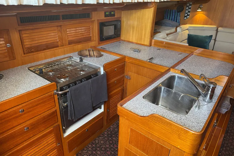 Slide: The Image of Luxurious 2020 J Boats J/160 yacht interior with modern kitchen and cozy seating area. - 10