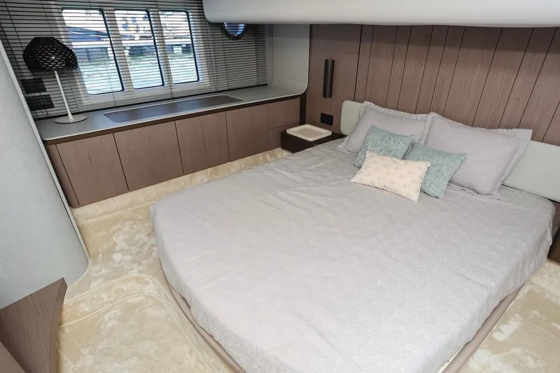 Slide: The Image of Luxurious bedroom interior of 2023 Azimut Fly 50 yacht with modern decor. - 53