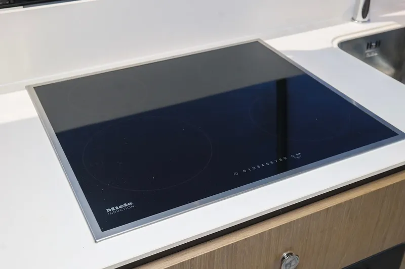 Slide: The Image of Modern induction cooktop on Azimut Fly 50 yacht, 2023 model. - 5