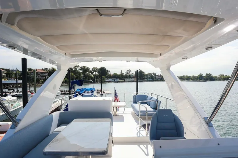 Slide: The Image of Luxurious 2023 Azimut Fly 50 yacht interior with elegant seating and scenic waterfront view. - 34