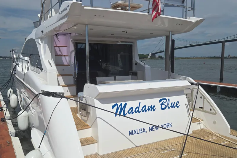 Slide: The Image of Azimut Fly 50 yacht "Madam Blue" docked, 2023 model, Malba, New York. - 2
